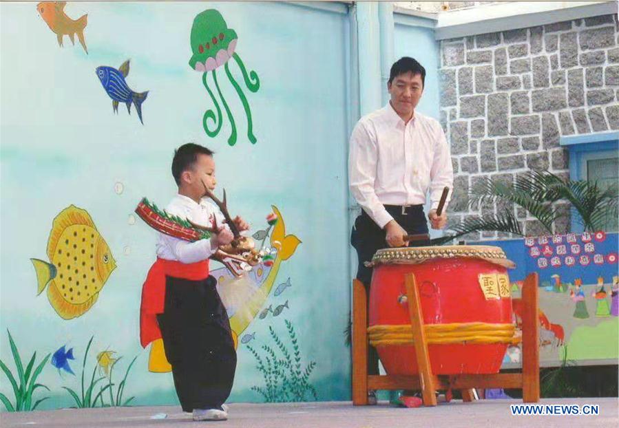 CHINA-MACAO-FISHMONGER-TRADITIONAL DRUNKEN DRAGON DANCE (CN)