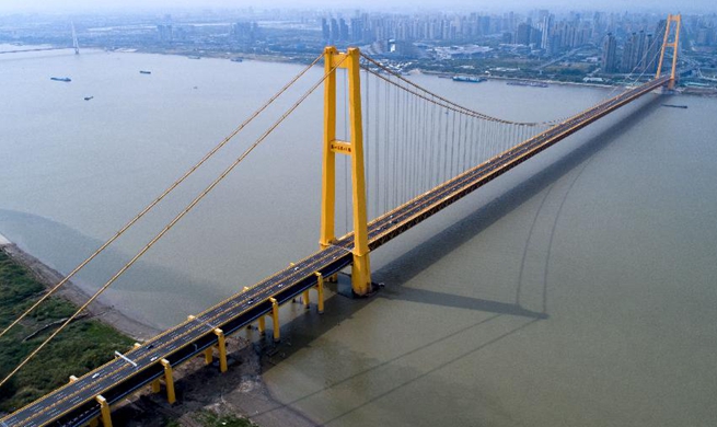 World's longest double-deck suspension bridge opens to traffic